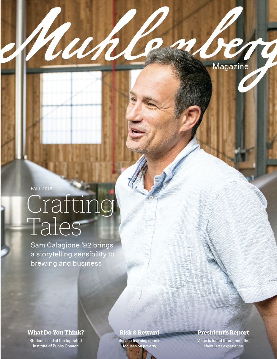 A cover that says Muhlenberg Magazine and has a photo of a man talking in a breewery